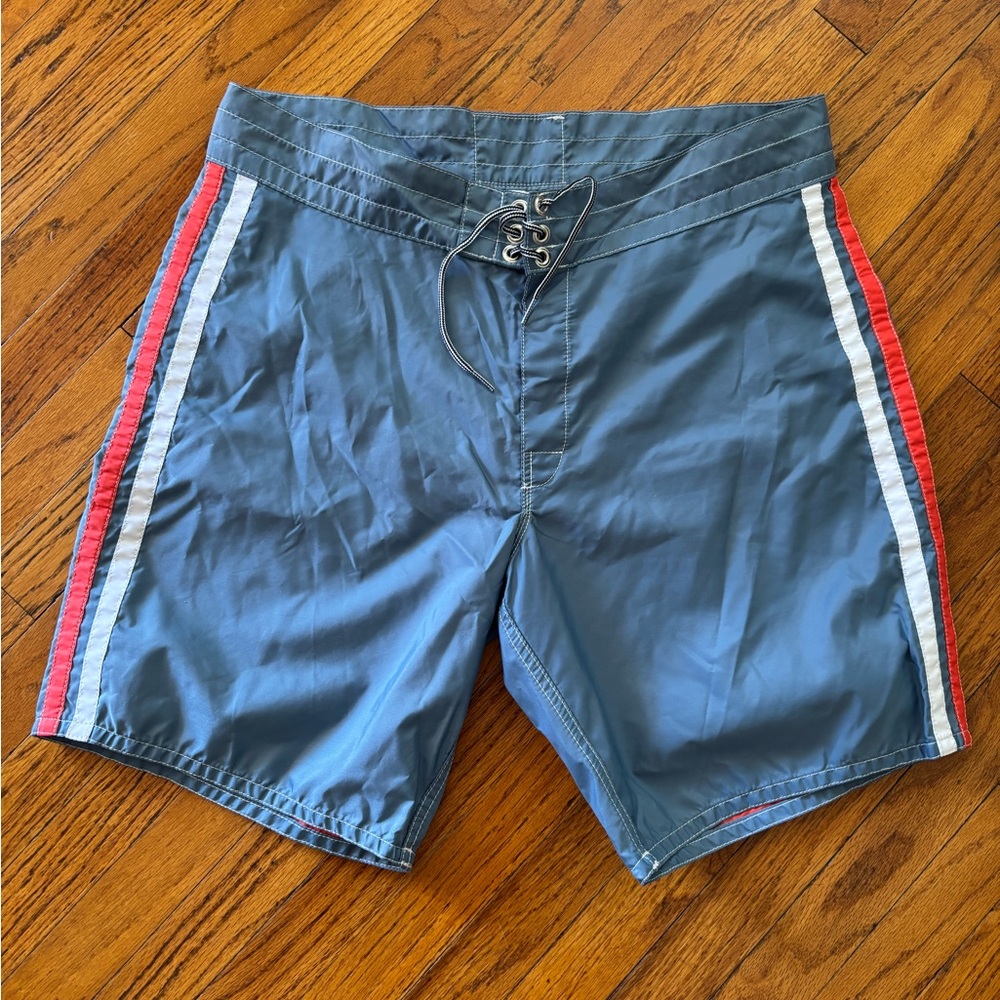 Birdwell Blue Board Shorts with Red and White Accents